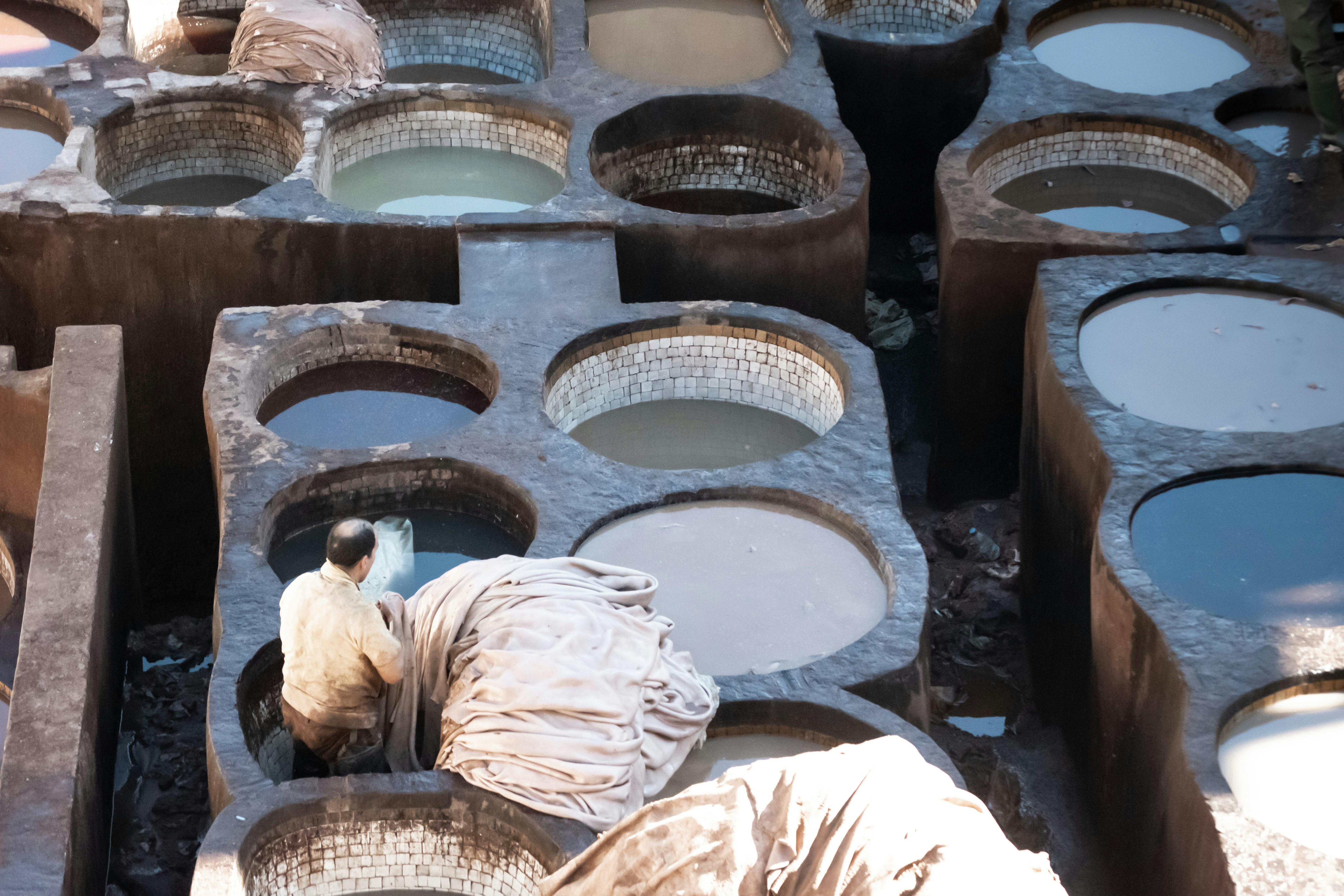 Leather worker at Fez, Morocco.