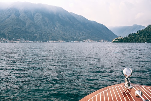 View of the majestic mountains surrounding Lake Léman from the boat deck.