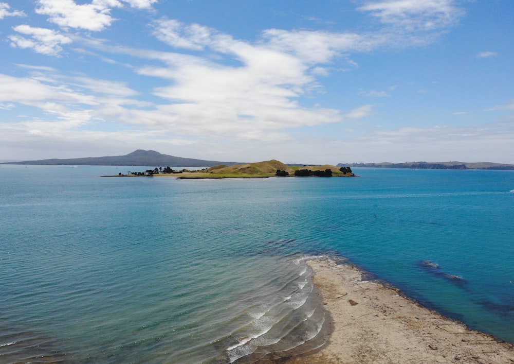 island between sea at daytime