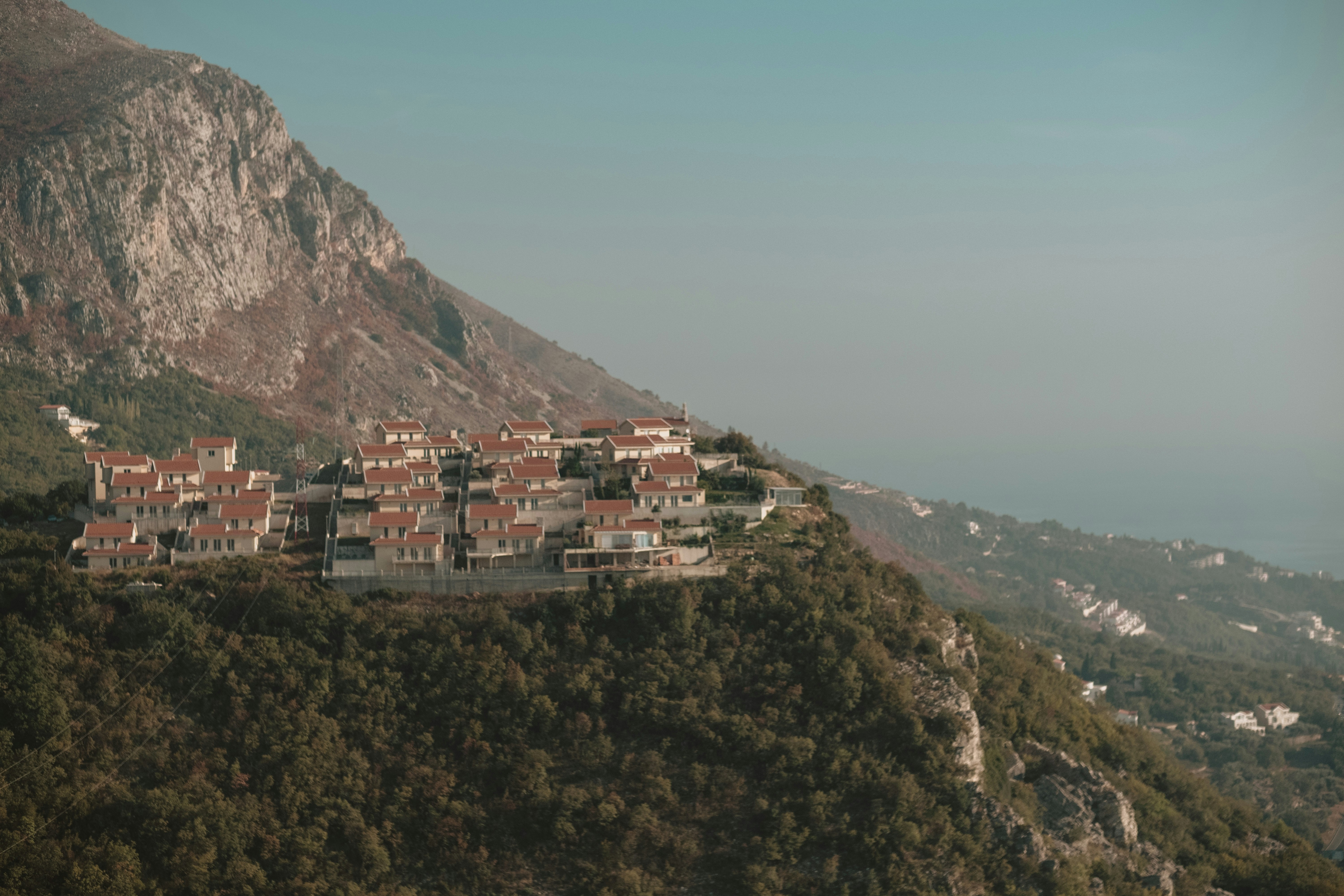 aerial photo of houses on mountain during daytime