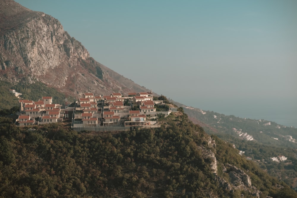 aerial photo of houses on mountain during daytime