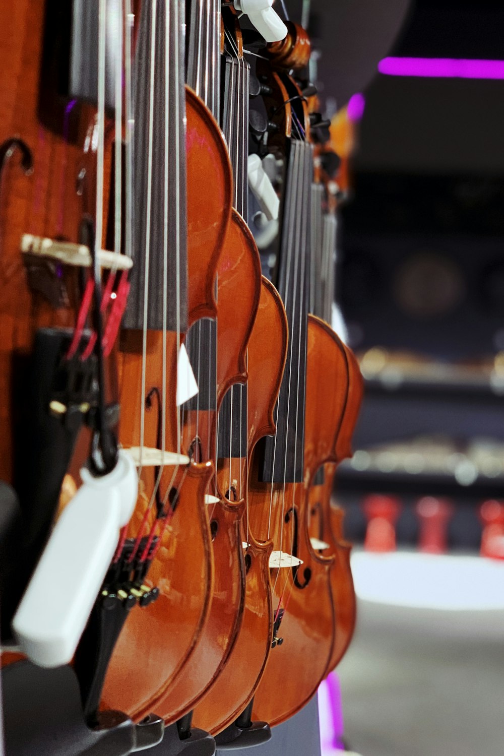 selective focus photography of violins