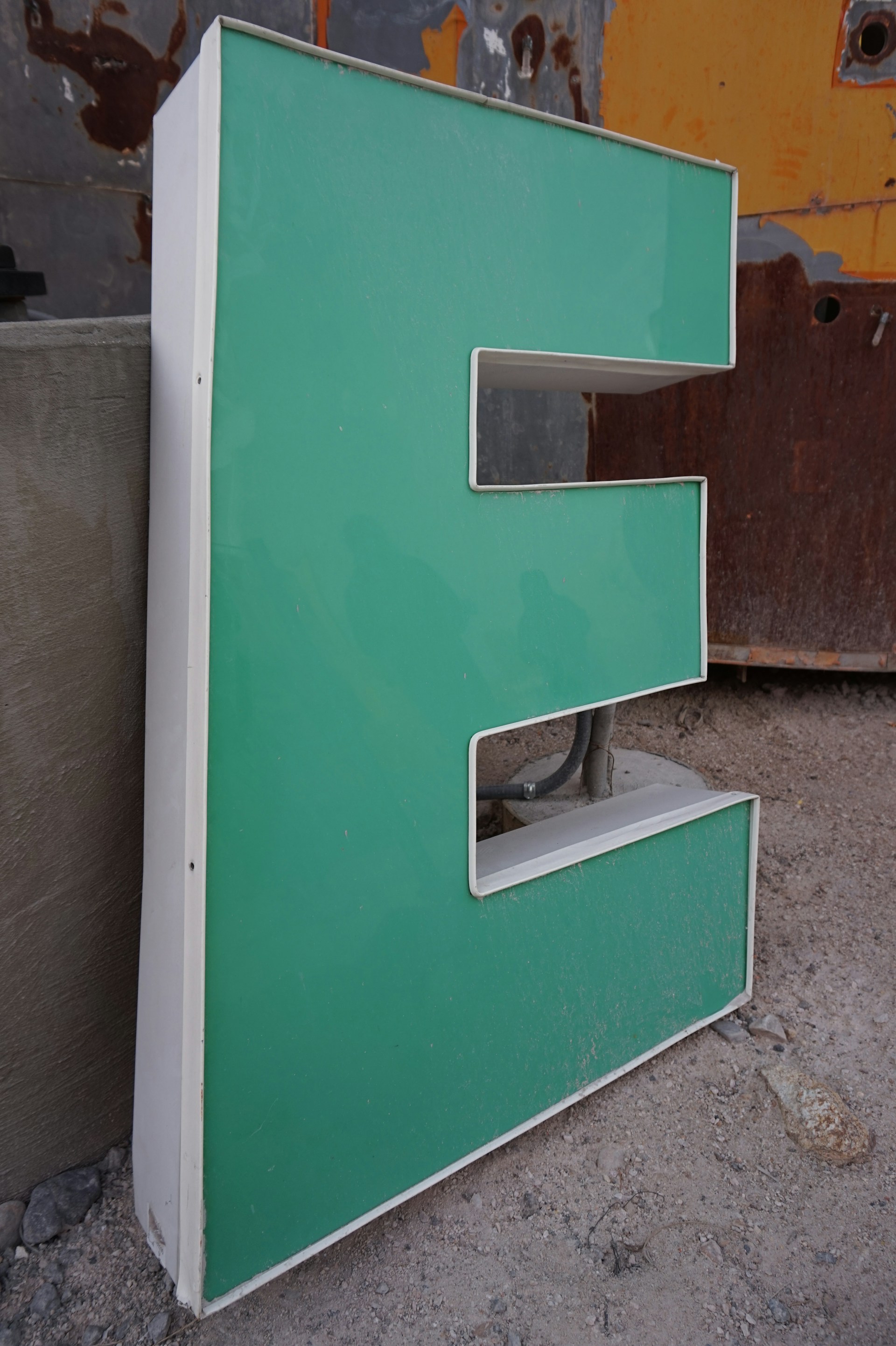 woman wearing yellow long-sleeved dress under white clouds and blue sky during daytime