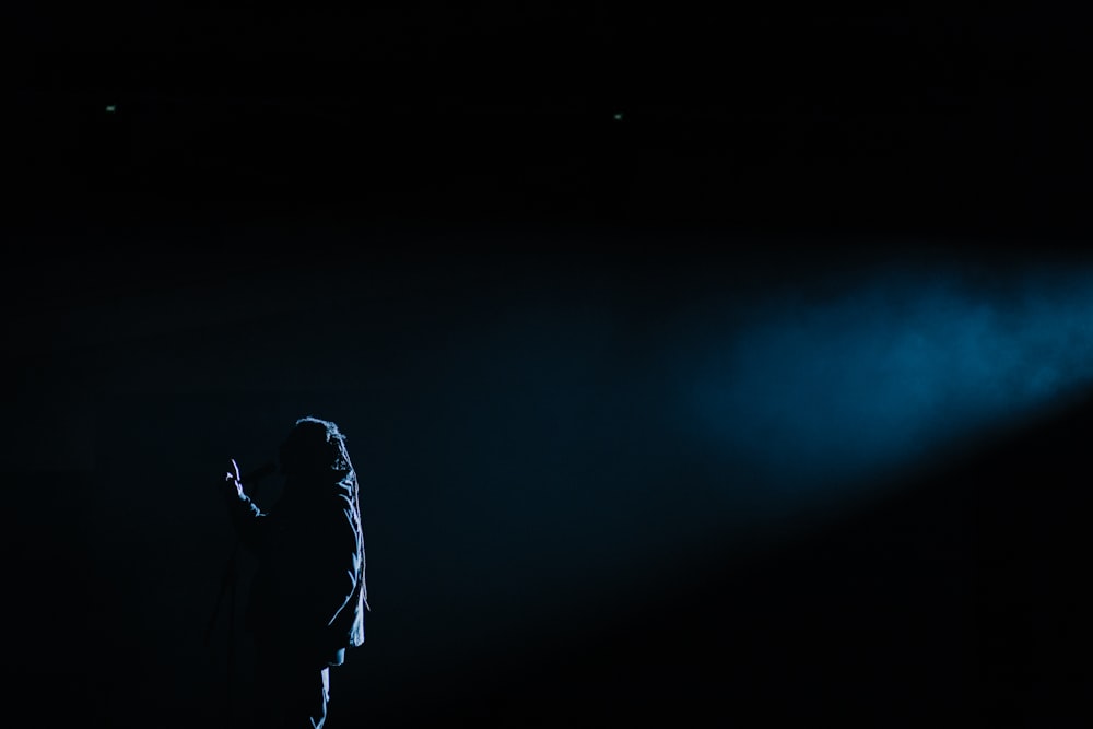 silhouette photography of person standing