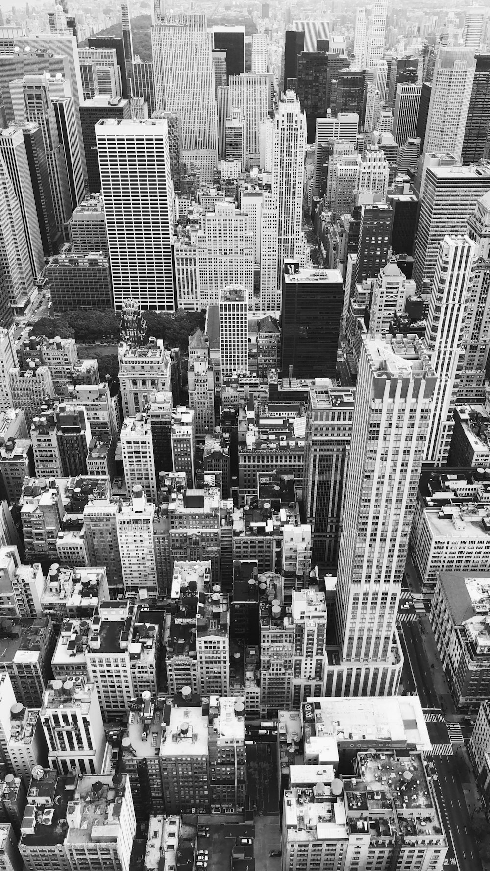 grayscale photography of city buildings