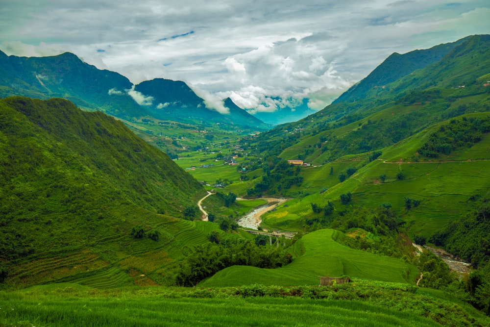 aerial view photography of mountain under cloudy sky