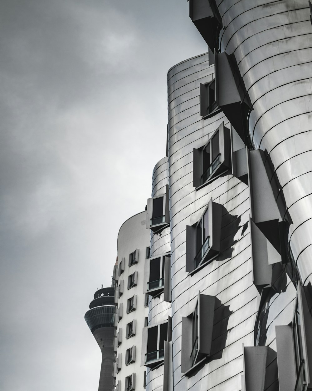 low-angle photography of concrete high-rise building