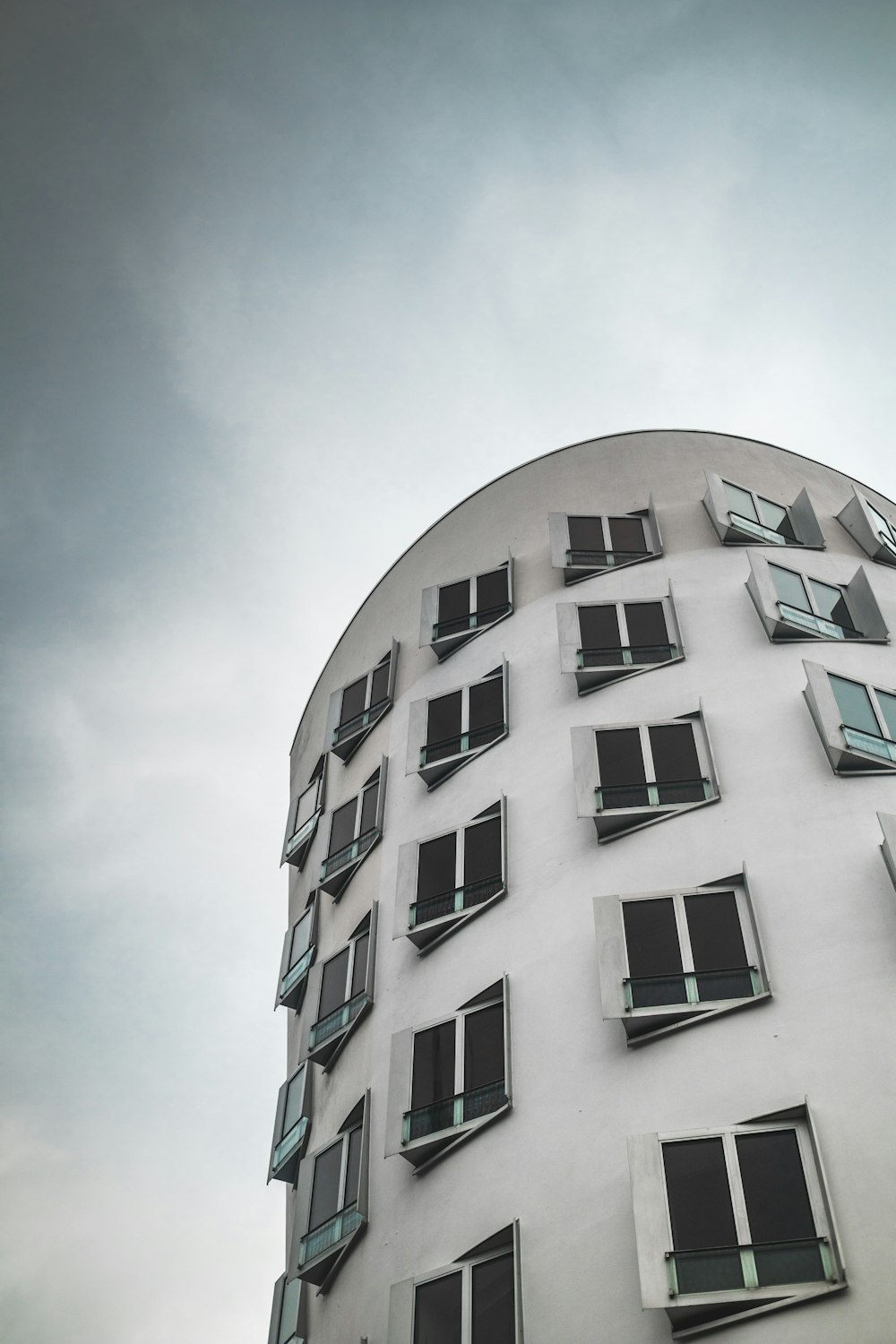 low angle photography of white painted building