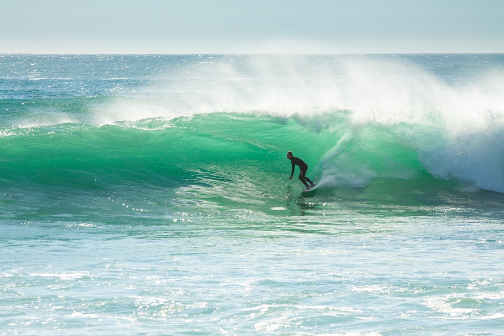 person surfing during daytime