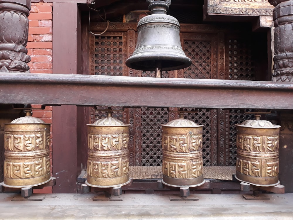 gray steel bell near door