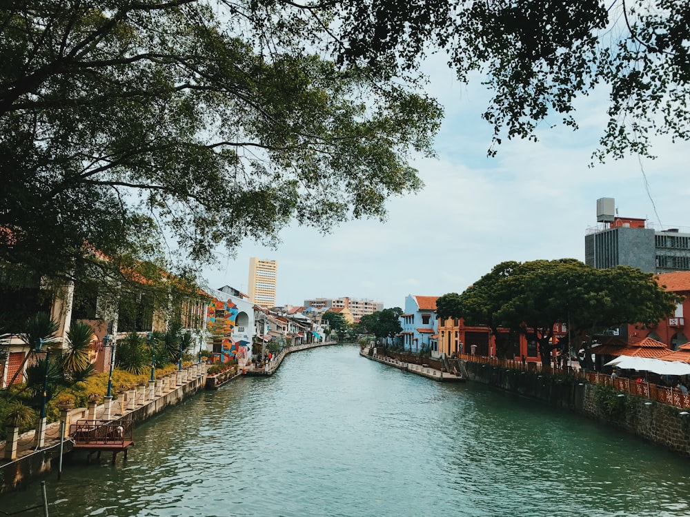 river between houses and buildings