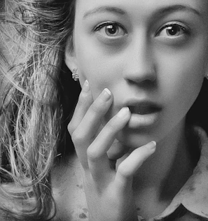 A candid shot of a young contributor passionately sharing their perspective during an interview.