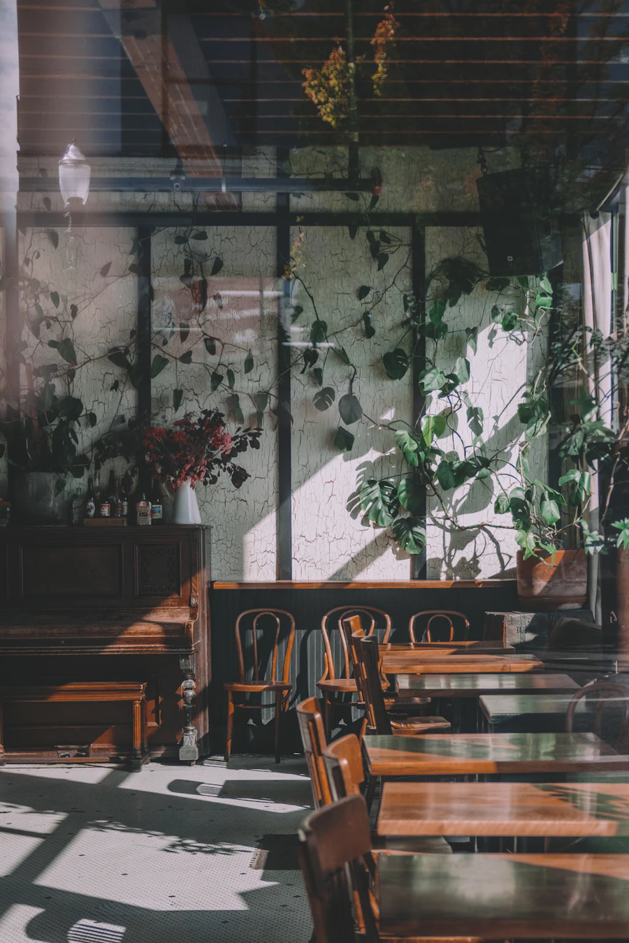 A repainted café interior with grey walls and white woodwork.