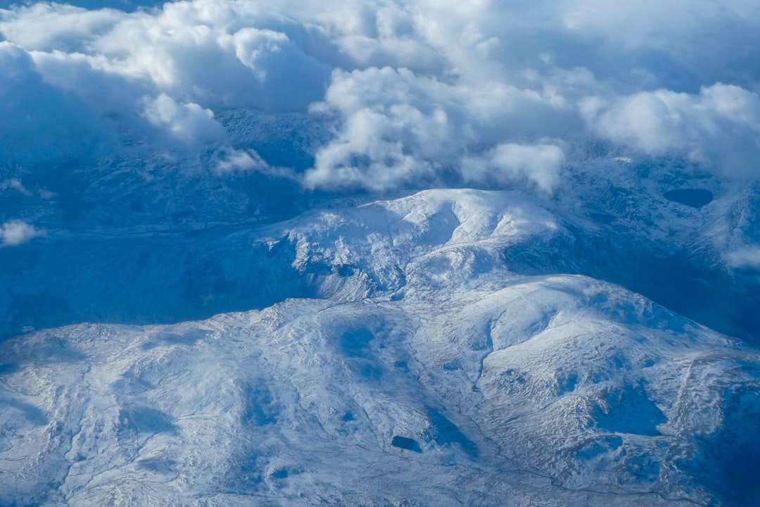 field filled with snow during daytime