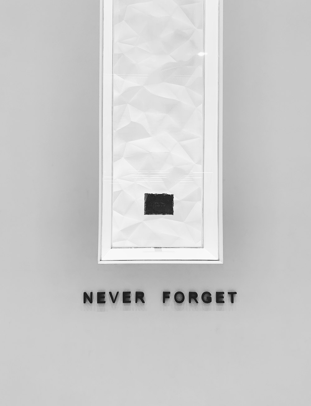 Never Forget text