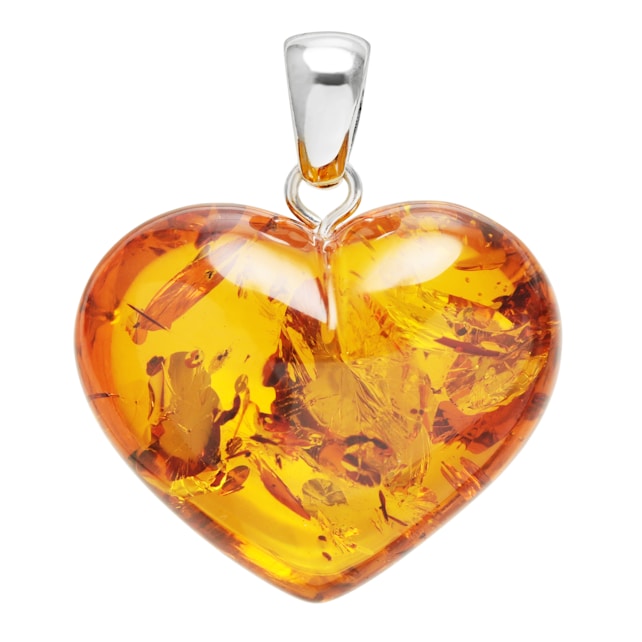A heart-shaped pendant made of amber with inclusions, attached to a silver metallic bail designed for a necklace.
