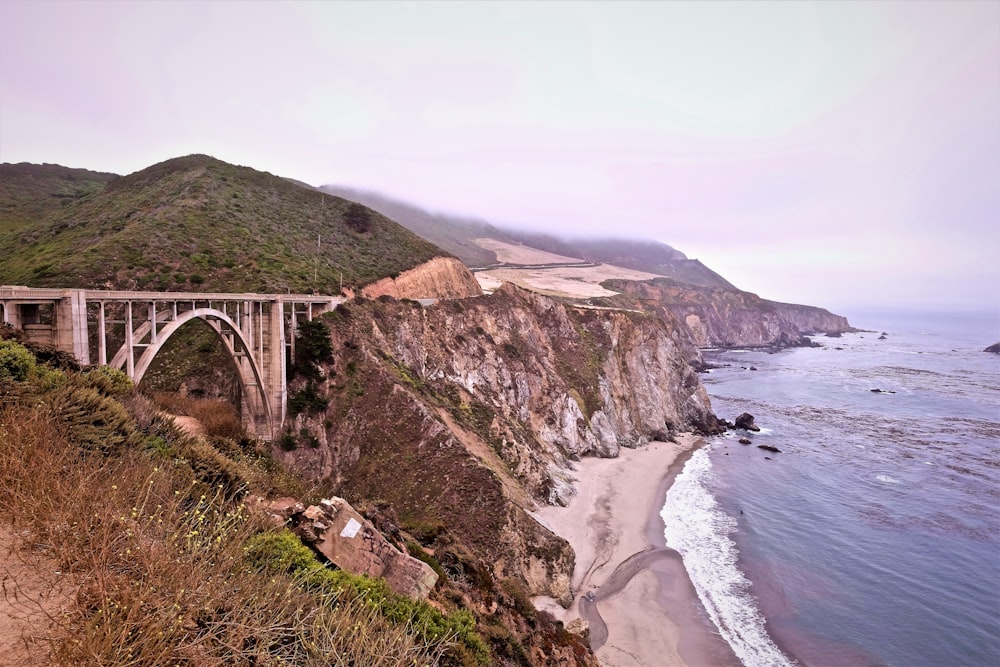 bridge near the sea during daytime