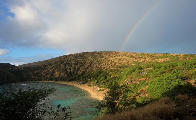Hanauma Bay crater with blue waters and snorkelers