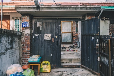 Wide-angle shot of the entrance gate to U.S. Society residential area.