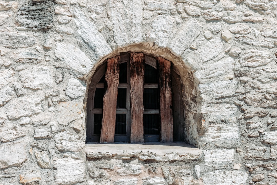 three brown wood on the window photo,