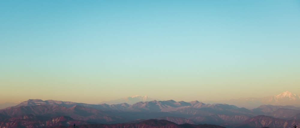 photo of brown mountains during daytime