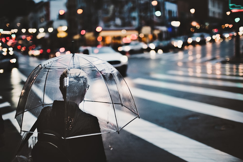 woman holding umbrella