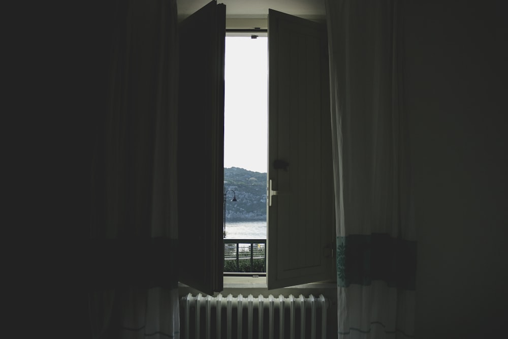 white wooden window open
