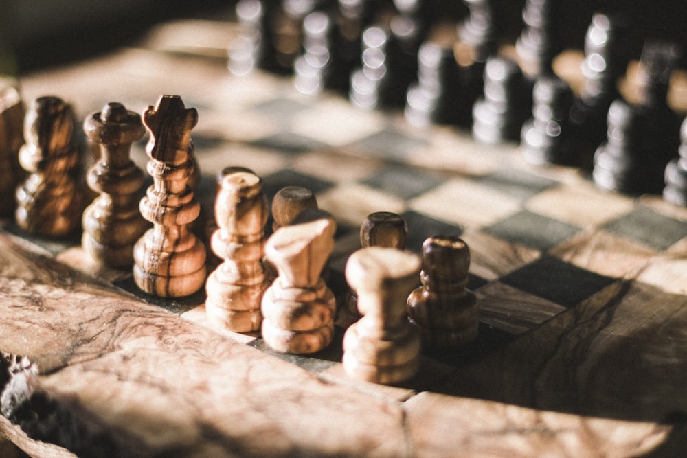 brown and black chessboard closeup photo