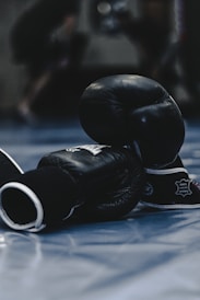 pair of black boxing gloves