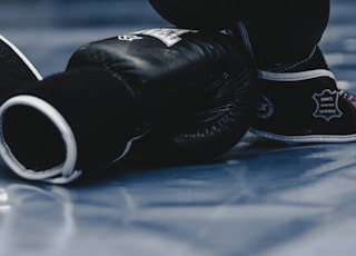 pair of black boxing gloves