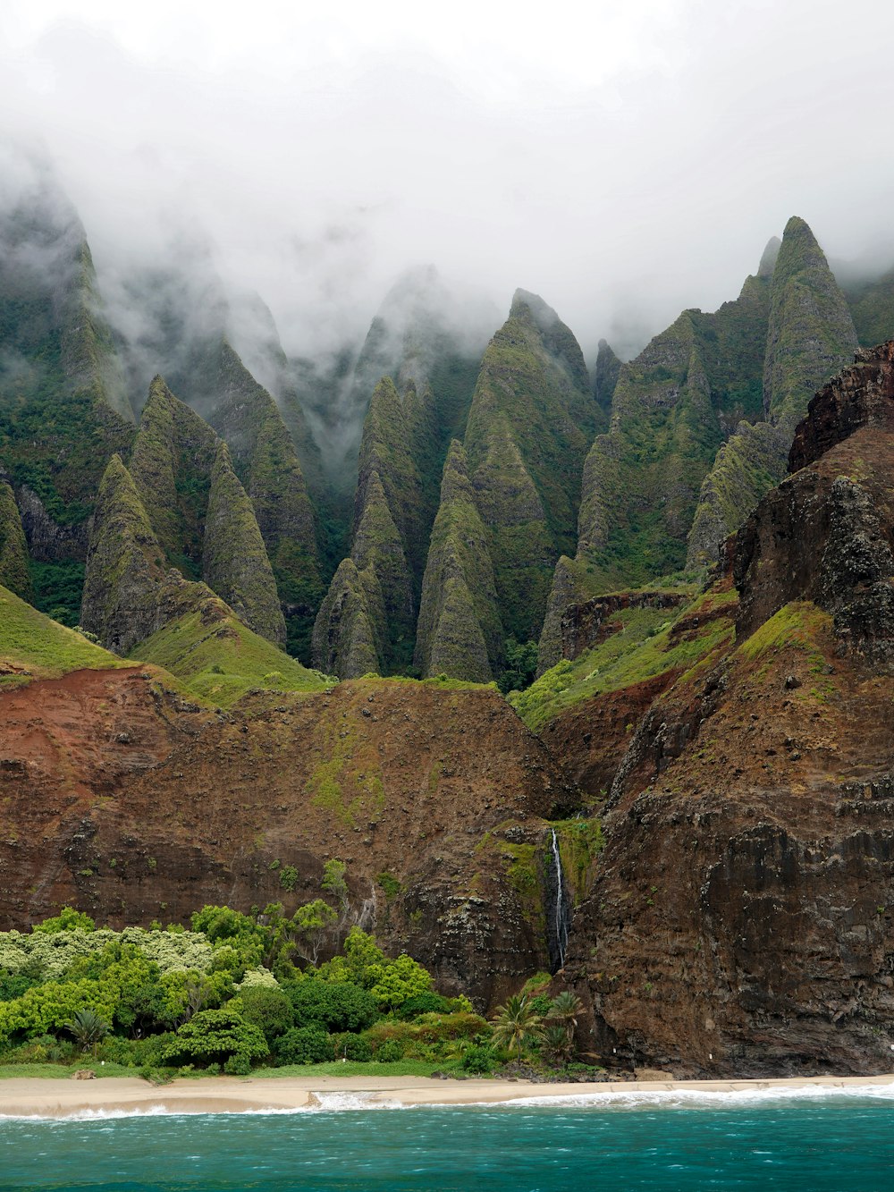 mountain range covered by clouds