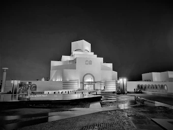 An elegant photo of a modern museum exterior captured with artistic lighting.