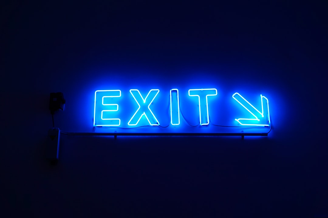 exit neon light signage