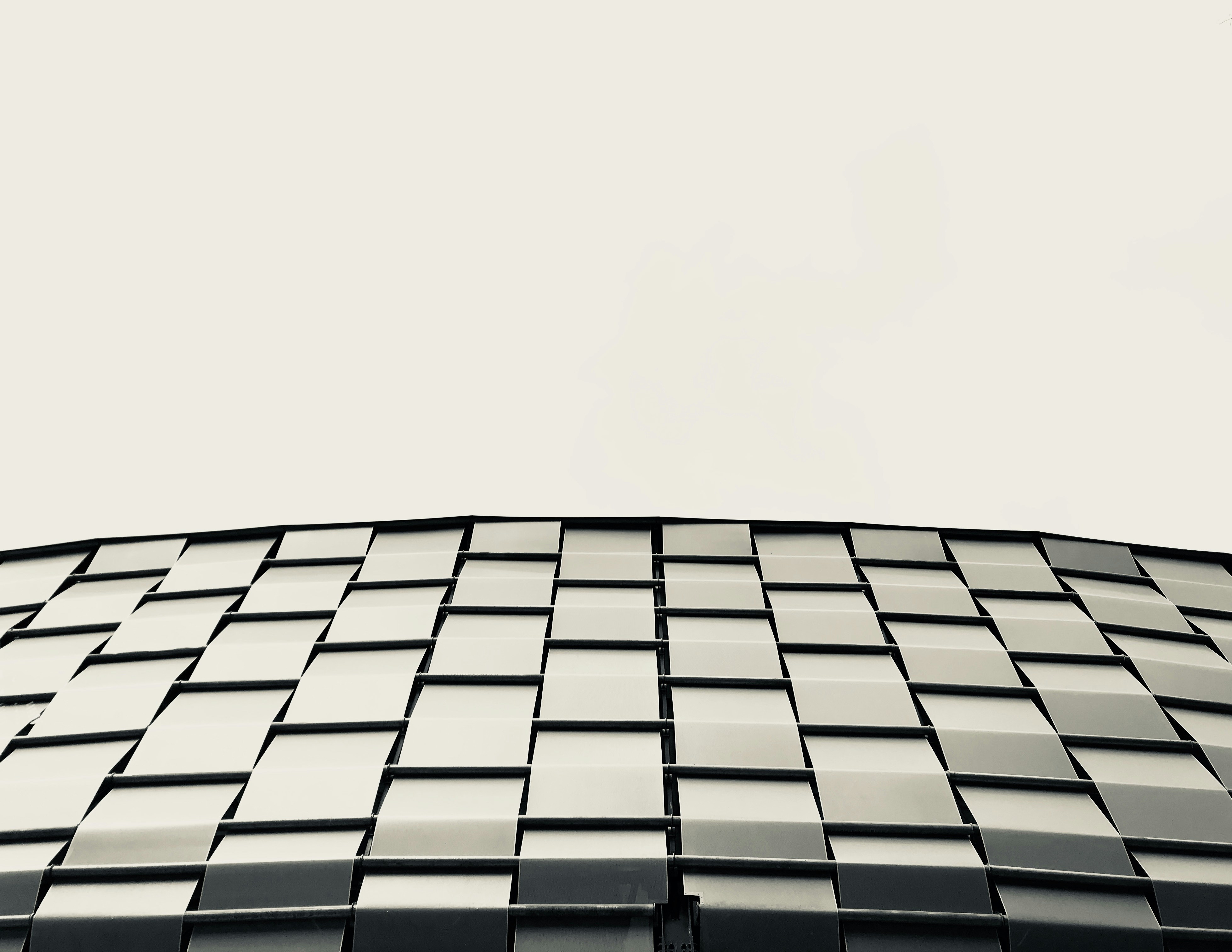 low angle photography of gray building