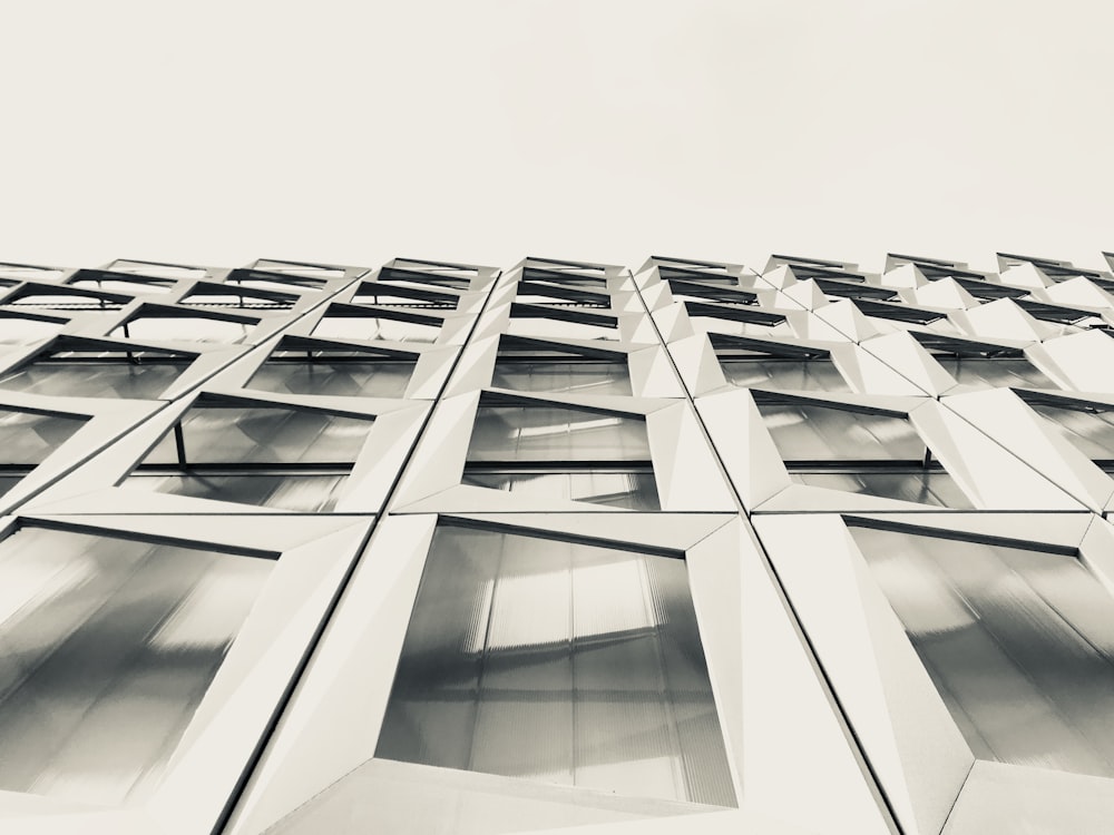 low angle photography of grey concrete building