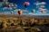 assorted-color hot air balloons over brown mountain range during daytime