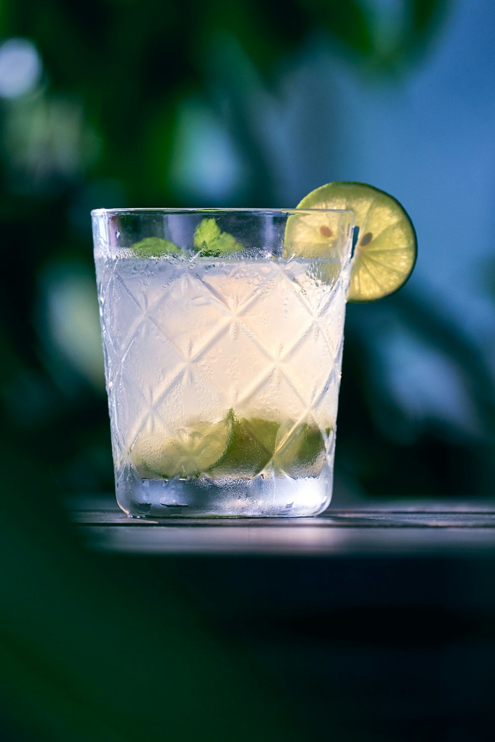 clear liquid inside clear drinking glass