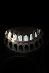 Interior view of a dome with soft natural light and wooden accents.