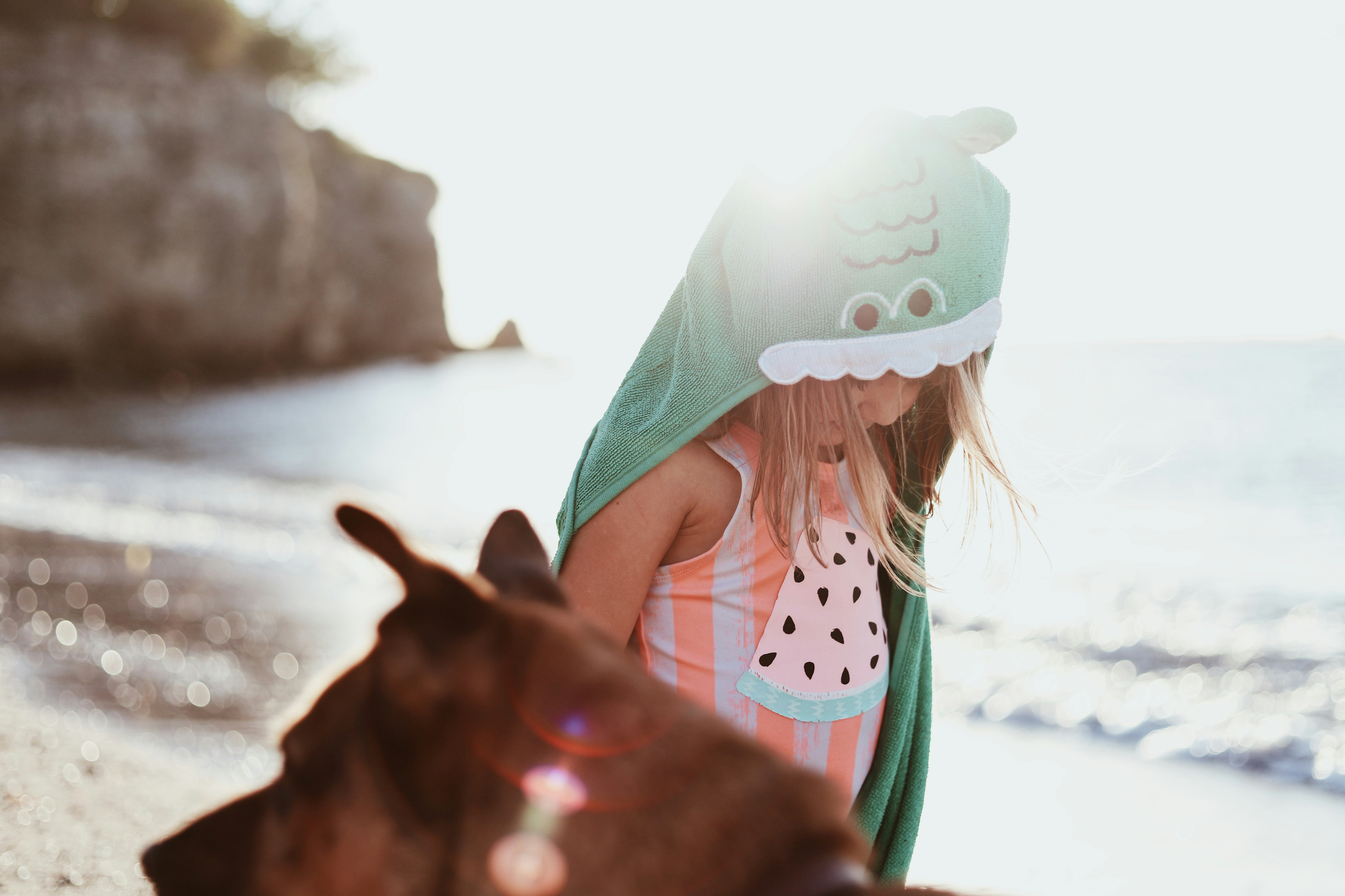 toddler wearing hooded coat