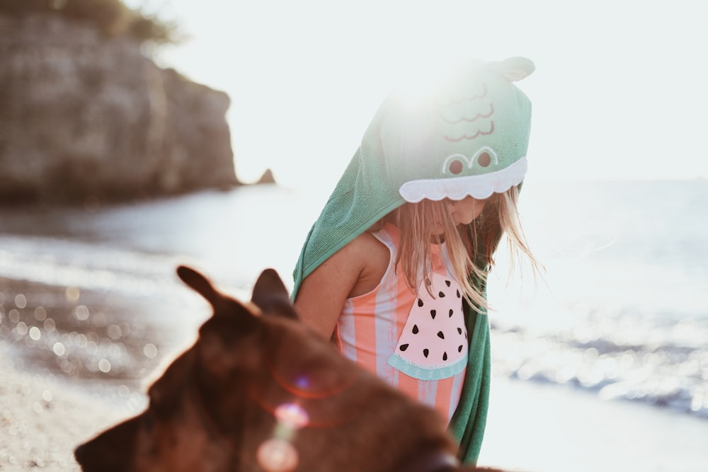 toddler wearing hooded coat