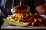 burger with cheese macaroni and fries