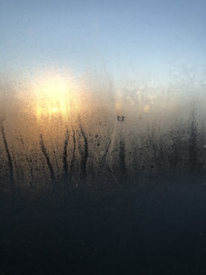 A close-up of a freshly cleaned window with no streaks.