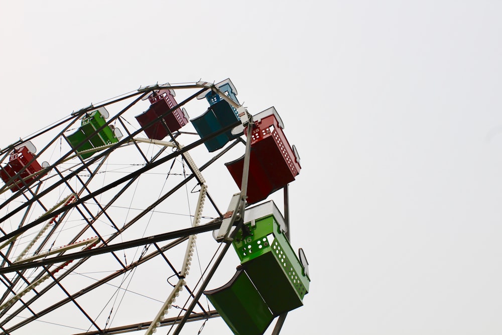 multicolored ferries wheel under white sky