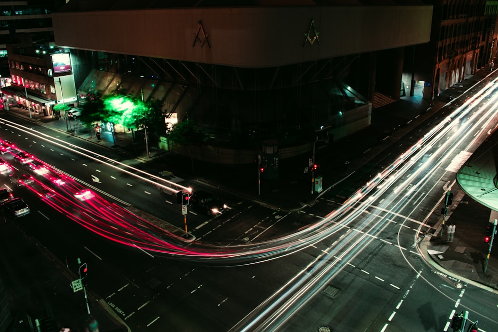 time lapse photography of road at night