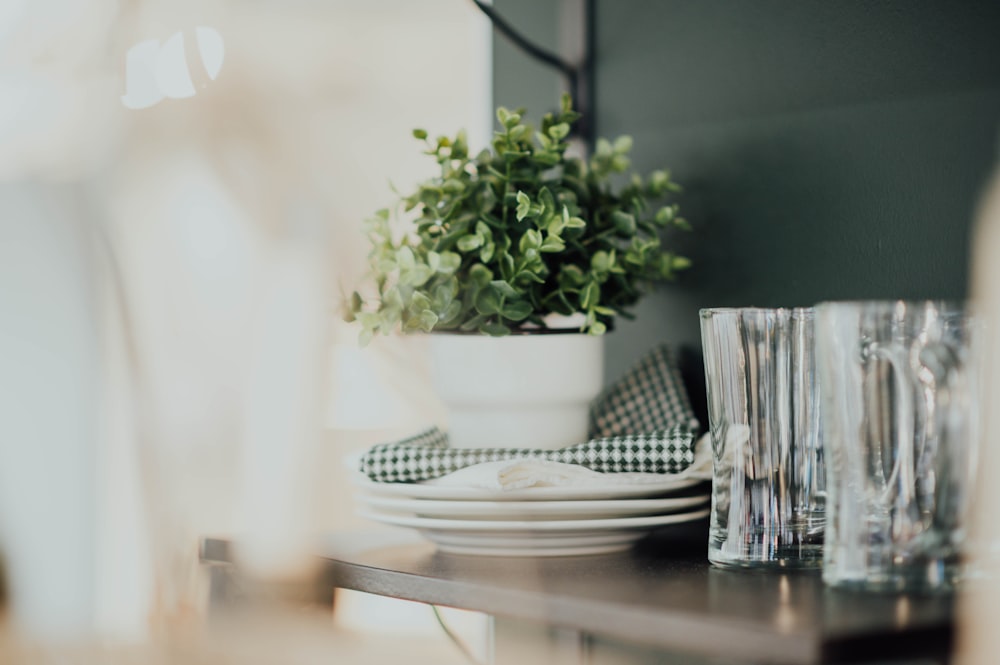 three white plates on table