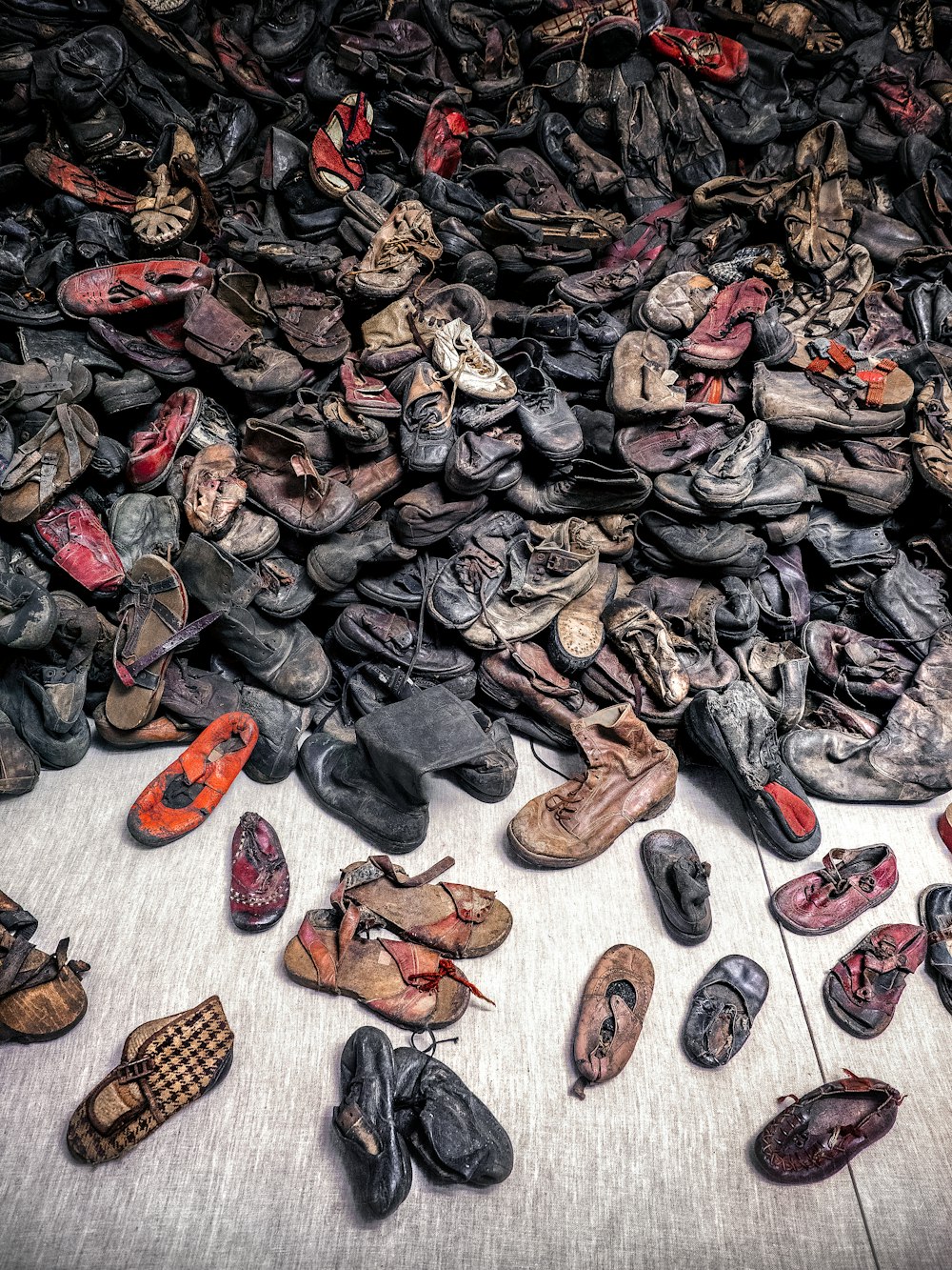 pile of assorted-color leather shoes