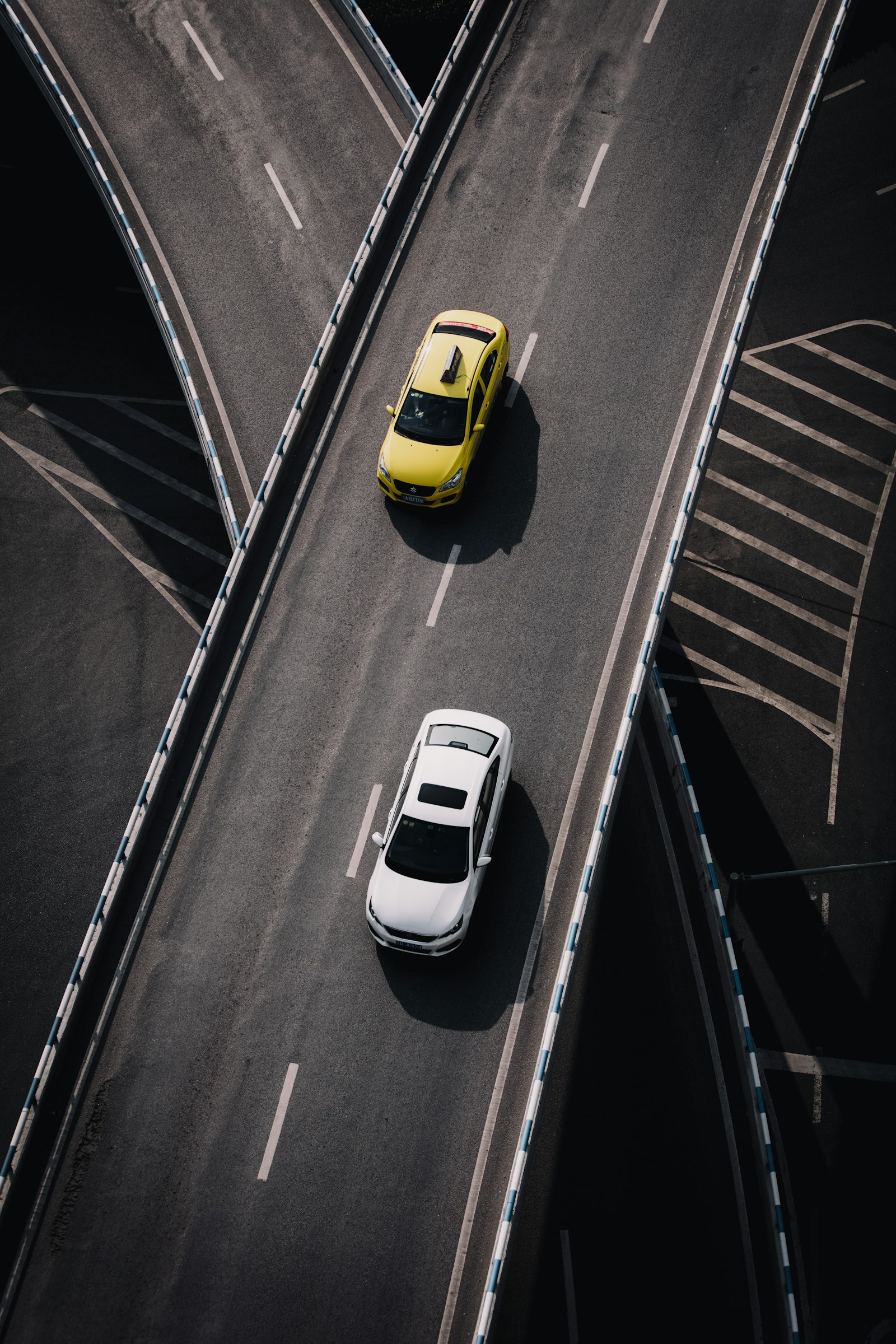 Canon EOS 5DS R + Canon EF 70-200mm F2.8L IS II USM sample photo. Yellow and white vehicles photography
