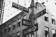 greyscale photo of street signage
