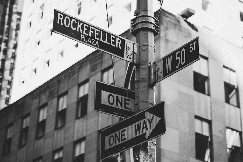 greyscale photo of street signage