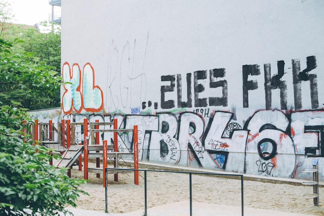 assorted graffiti on white wall